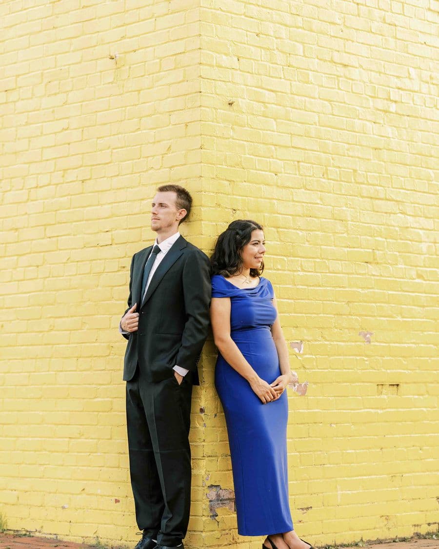 Engagement session against a yellow wall in Washington DC — DC engagement photographer